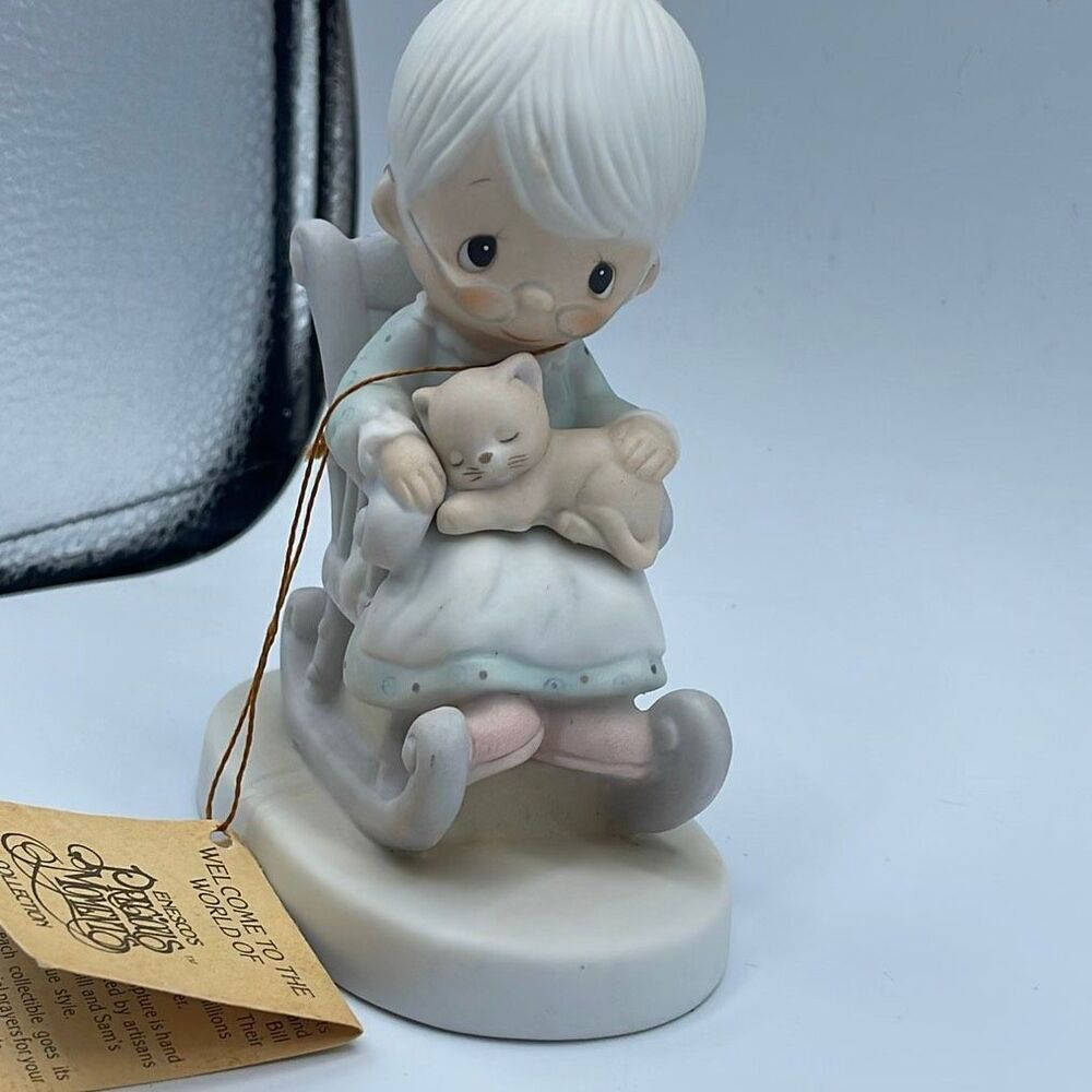 Precious Moments Enesco “Purr-fest Grandma” figurine.